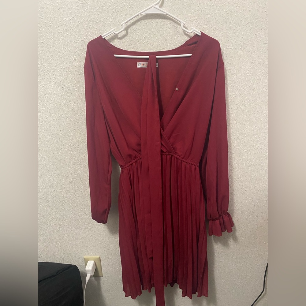 Red/maroon dress.